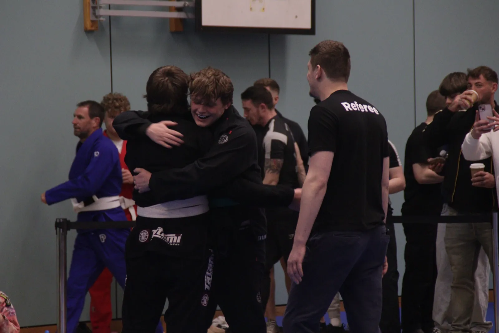 Tyler celebrating with a teammate after winning gold